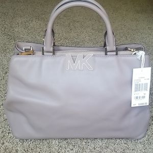 Pre-owned with tags. Florence Satchel Bag